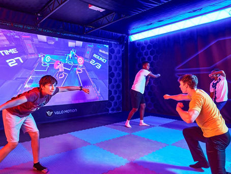 kids playing in the vr arena at the fun lab