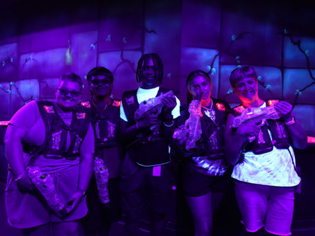 Group enjoying laser tag and team activities together at The Fun Lab in Blaine, MN