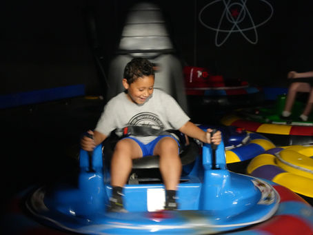 kids playing bumper cars at the fun lab 