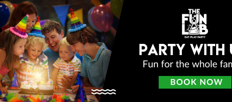 Kids playing laser tag and arcade games during birthday party at The Fun Lab in Blaine, MN