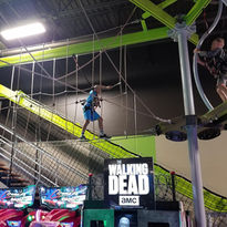 Kids climbing through the ninja obstacle course at The Fun Lab in Blaine, MN