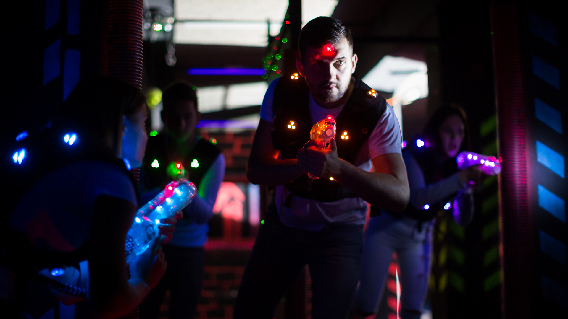 adults playing laser tag at the fun lab