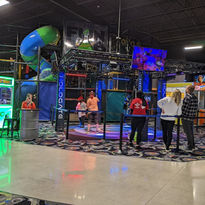 Colorful indoor playground with slides and climbing structures at The Fun Lab in Blaine, MN